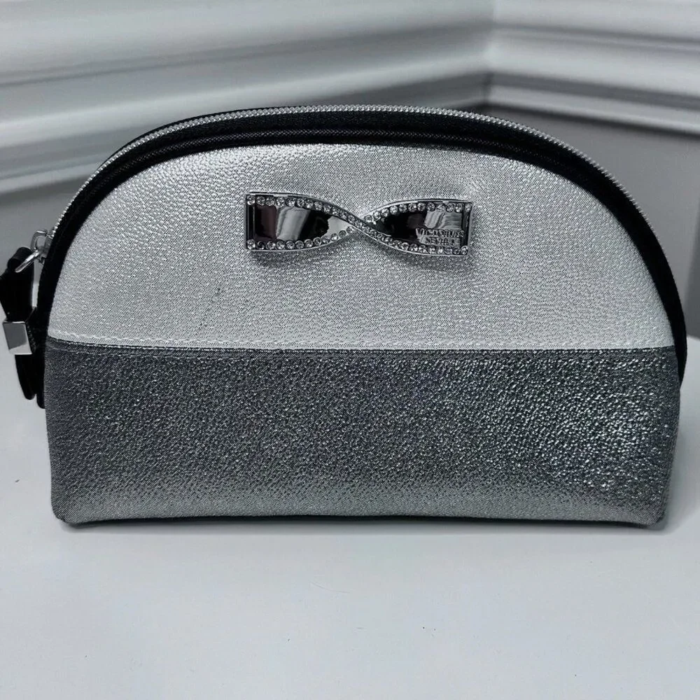 VICTORIA'S SECRET Two-Tone Silver makeup Beauty‎ Bag w/ Silver Bow zip close.